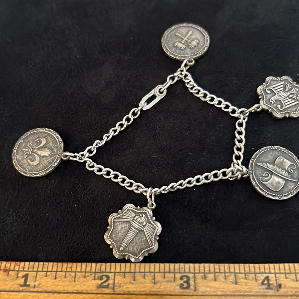 Vintage stamped Sterling Silver bracelet and charms